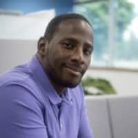 Man in Purple Polo Shirt