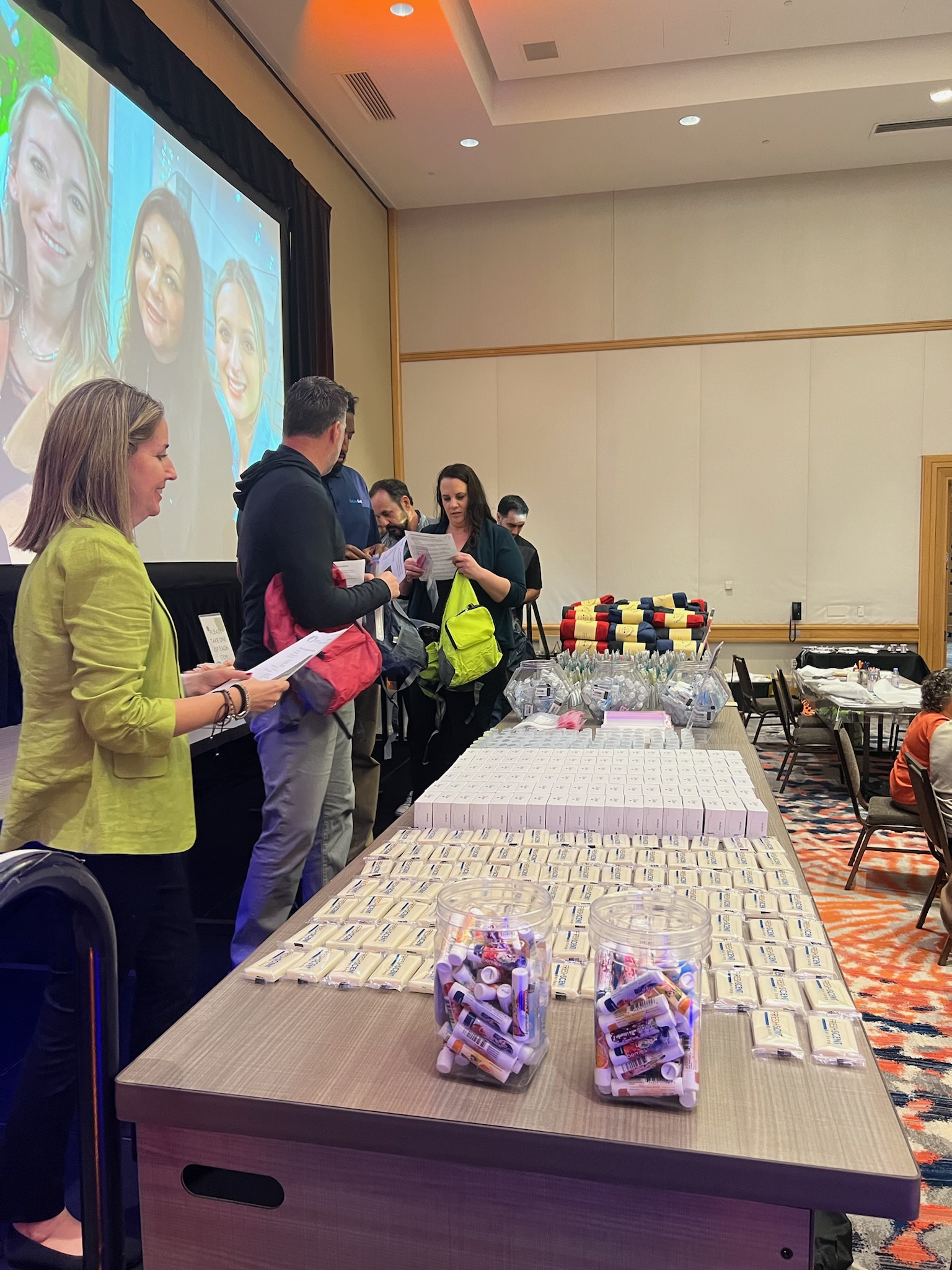 group photo of team members working together at Retiree First growth summit
