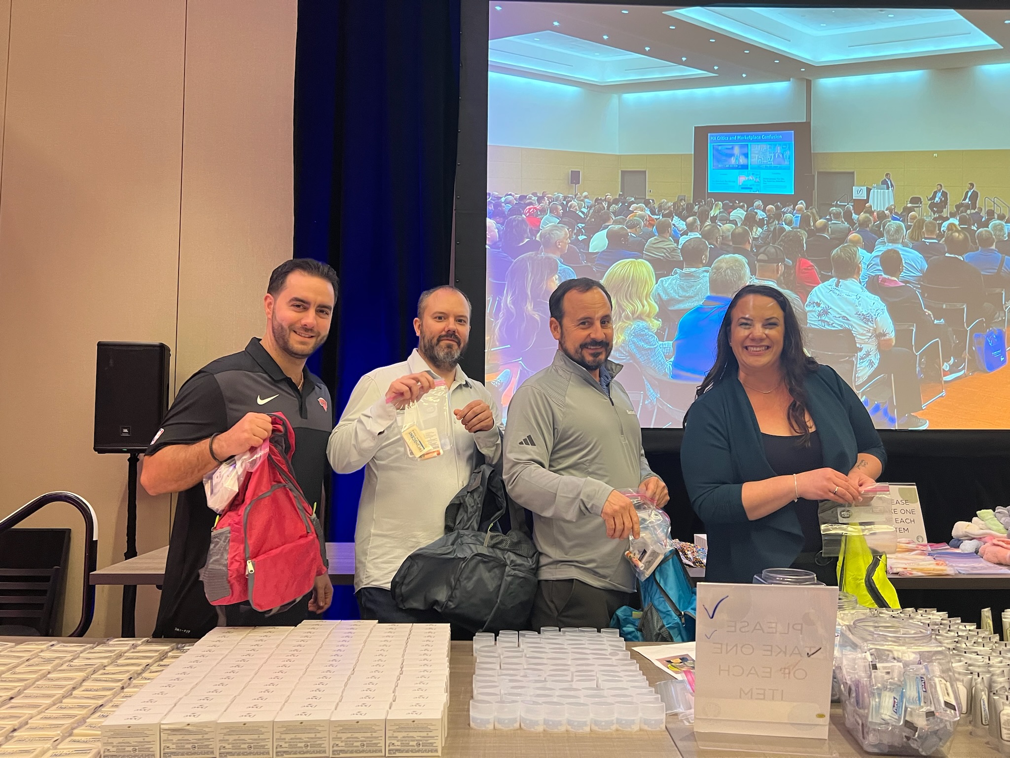 group photo of team members working together at Retiree First growth summit