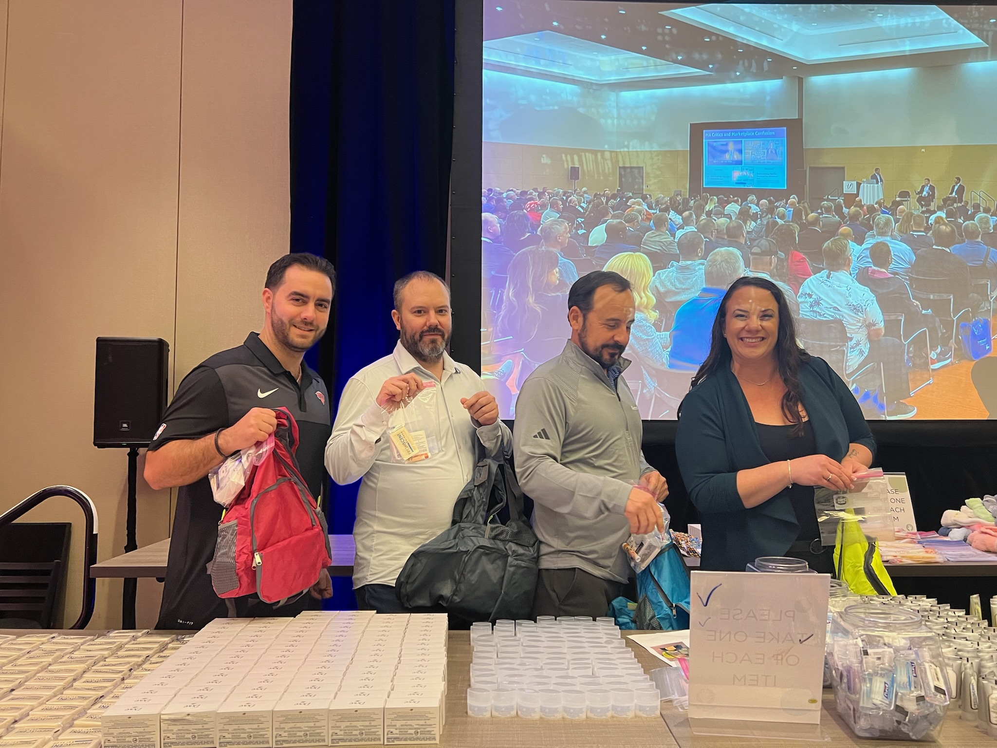 group photo of team members working together at Retiree First growth summit