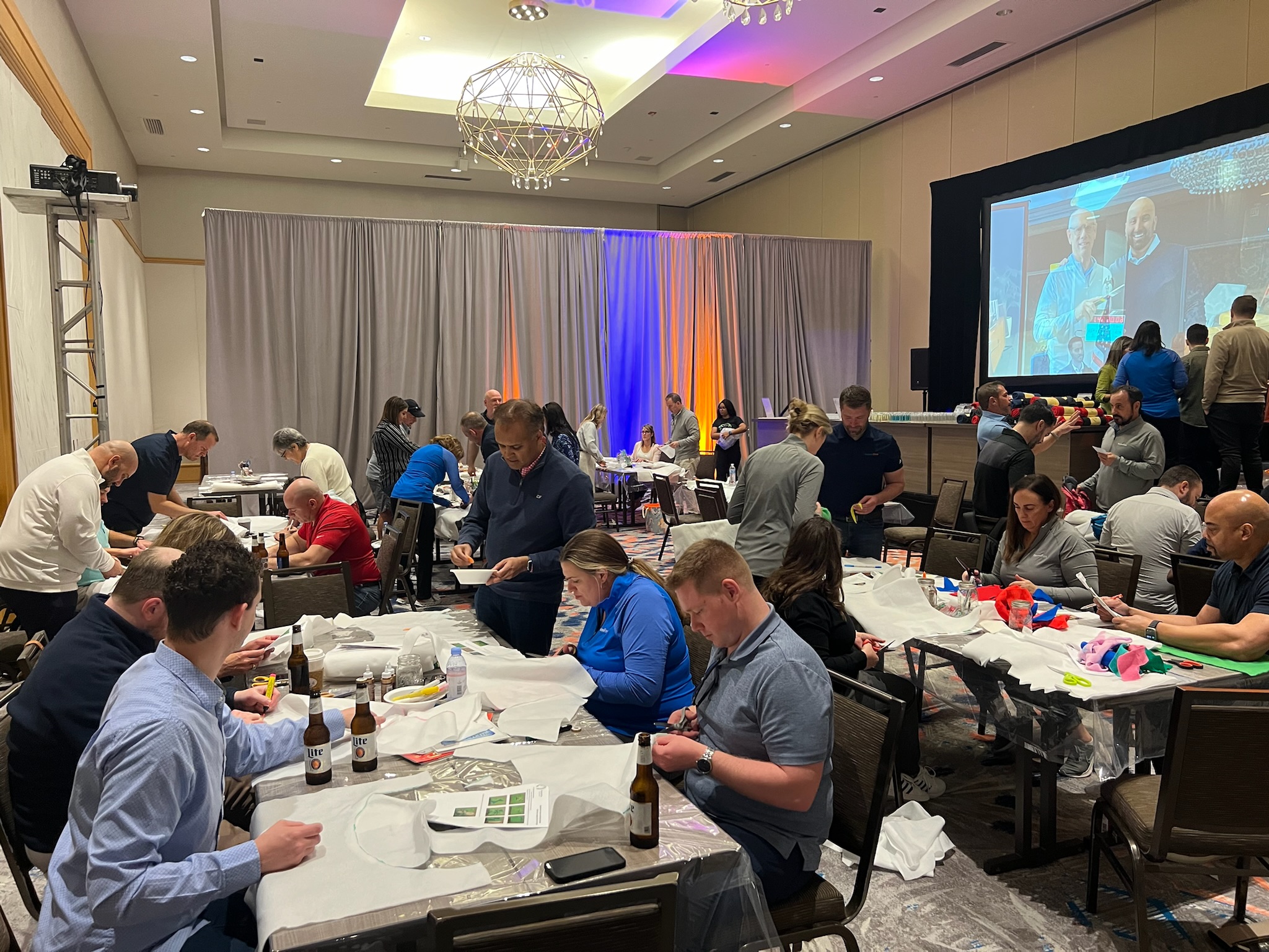 group photo of team members working together at Retiree First growth summit