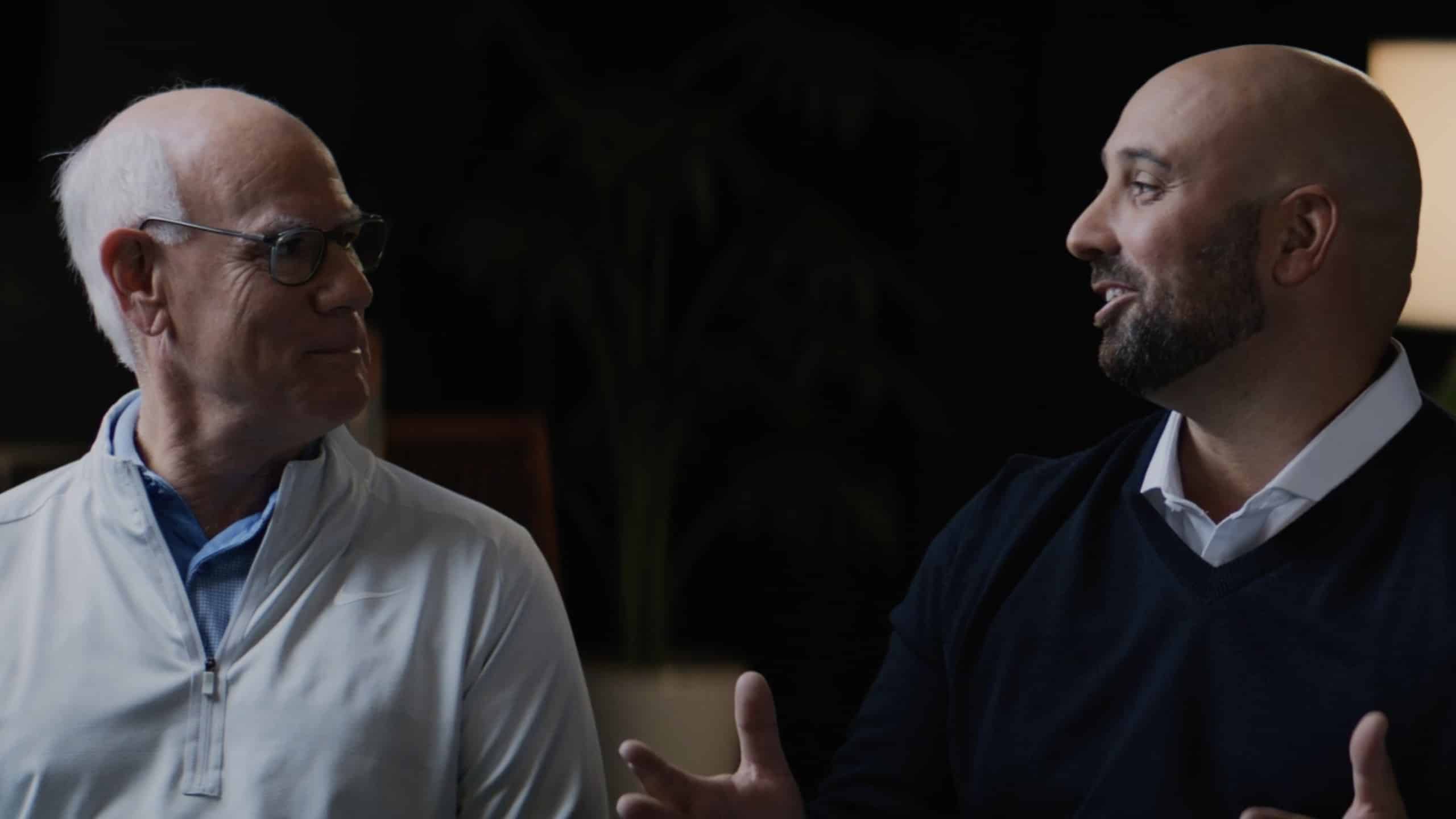 Two men talking