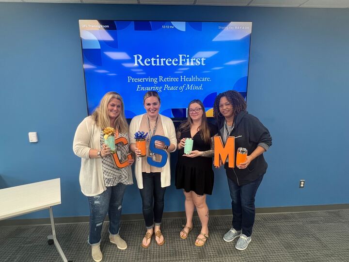 A Retiree First team member group photo
